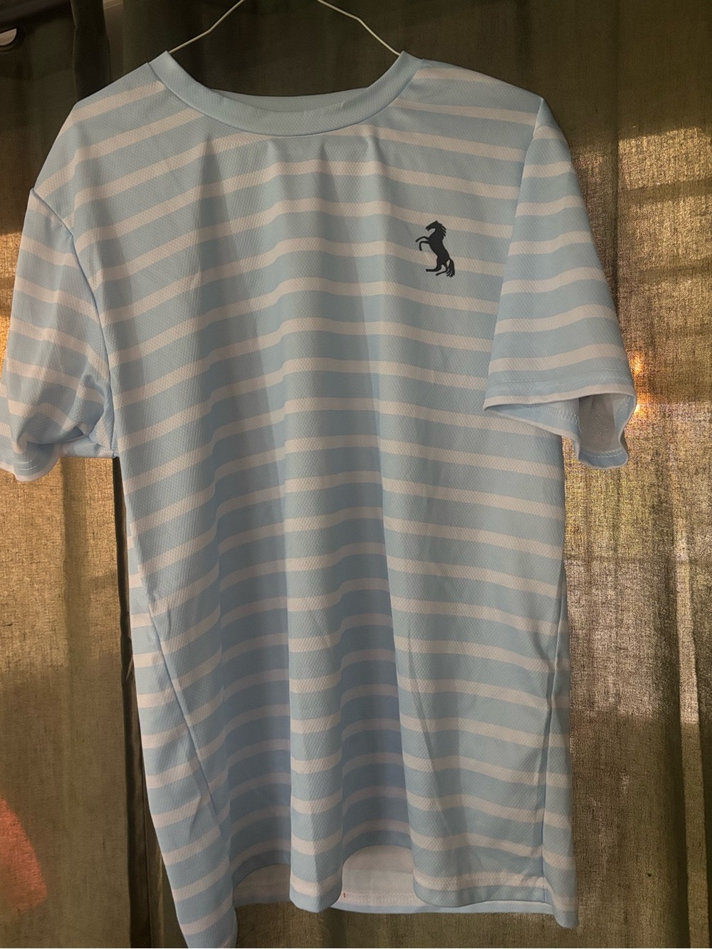 Light Blue Striped Men’s Crew Tee with horse Logo 100 % polyester size L